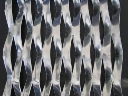 Expanded metal steel sheet details with raised surface and diamond holes.