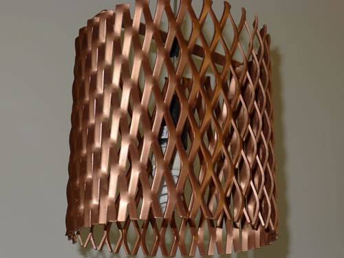 Raised expanded copper coated meshes with diamond holes are used as
