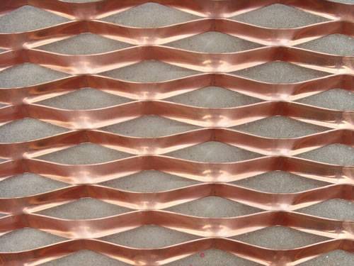 Raised copper expanded metal mesh details with diamond holes.