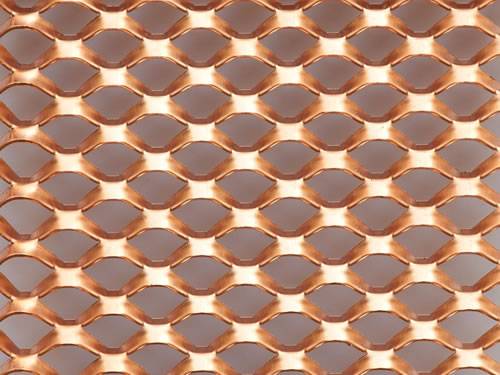 Thick raised copper expanded metal mesh details with hexagonal holes.